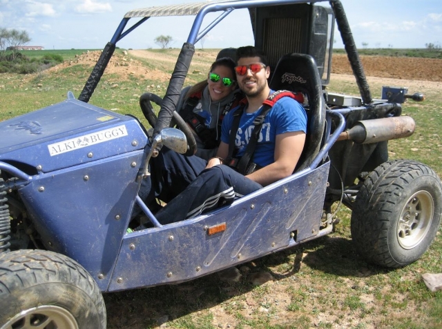  In the buggy with his girlfriend 